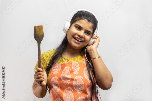 Indian housewife in kitchen