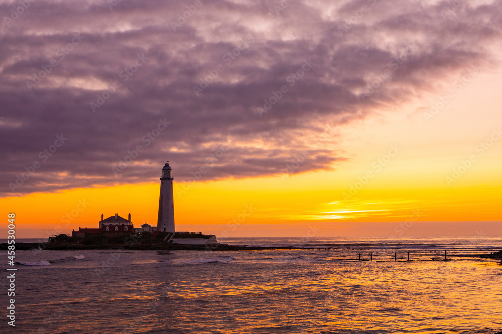 Sunrise at St. Marys Lighthouse in Northumberland, UK