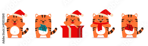 cute little tigers cats in a flat style. Animal with a Christmas cap, with a gift in a gift box. Orange tiger symbol of Chinese New Year 2022 For banner, nursery, patterned decor. Vector illustration.