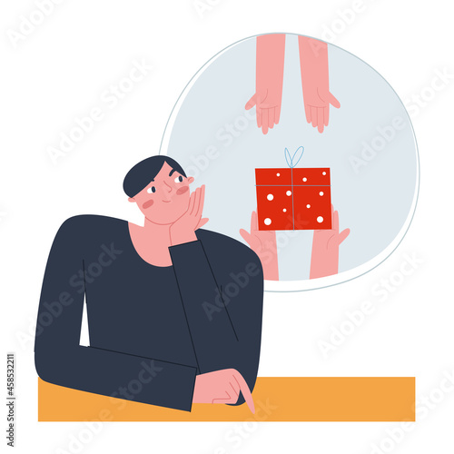 Φωτογραφία A man sits at the table and thinks what gift to give his friend