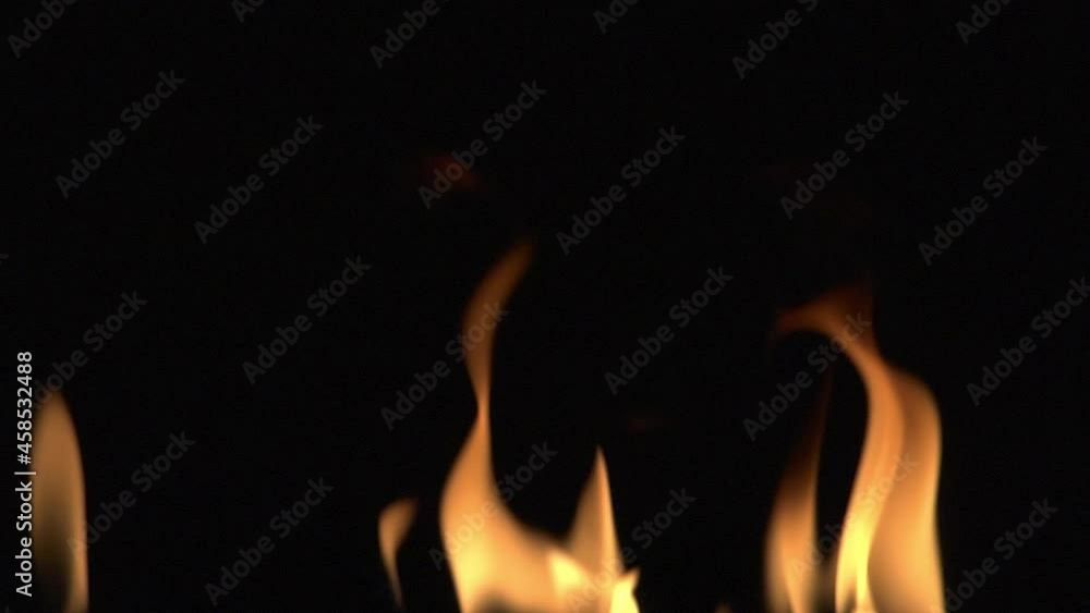 Natural orange flames on a black background. Natural orange flames on a black background.
