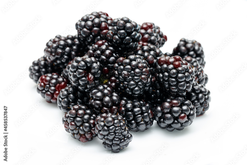 Ripe blackberries on a white plate. Useful forest fruits. Super food. Concept of healthy eating. top view. Close-up. Macro. Blackberry berries with water drops. Flat lay Ripe blackberries on a white plate. Useful forest fruits. Super food. Concept of healthy eating. top view. Close-up. Macro. Blackberry berries with water drops. Flat lay