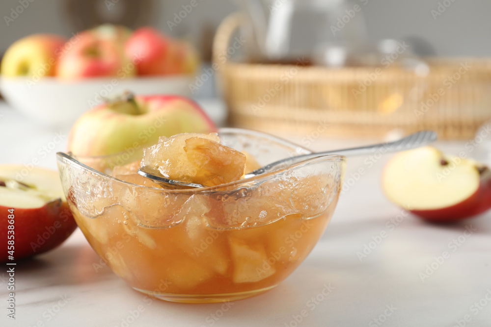 Delicious apple jam and fresh fruits on white table, closeup Delicious apple jam and fresh fruits on white table, closeup