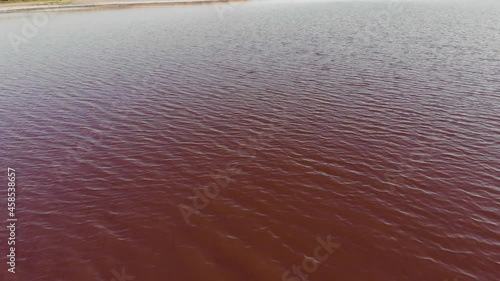 aerial view of red lake in ukraine odessa kuyalnik liman red water from above photo