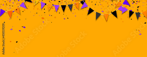 Holiday flags garland and colorful confetti.
