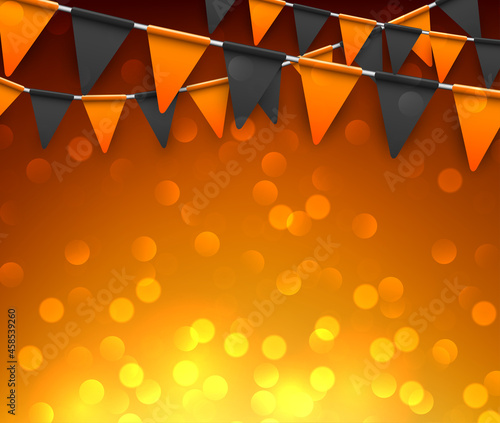 Flags garland with orange bokeh lights.
