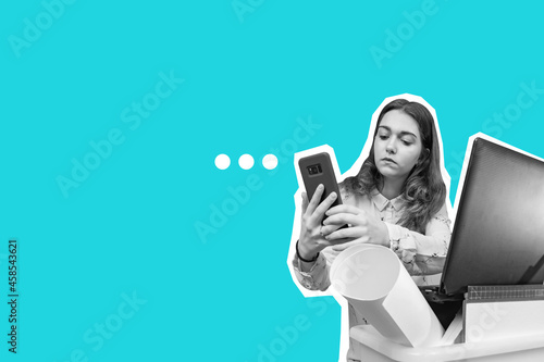 A girl with a smartphone on...