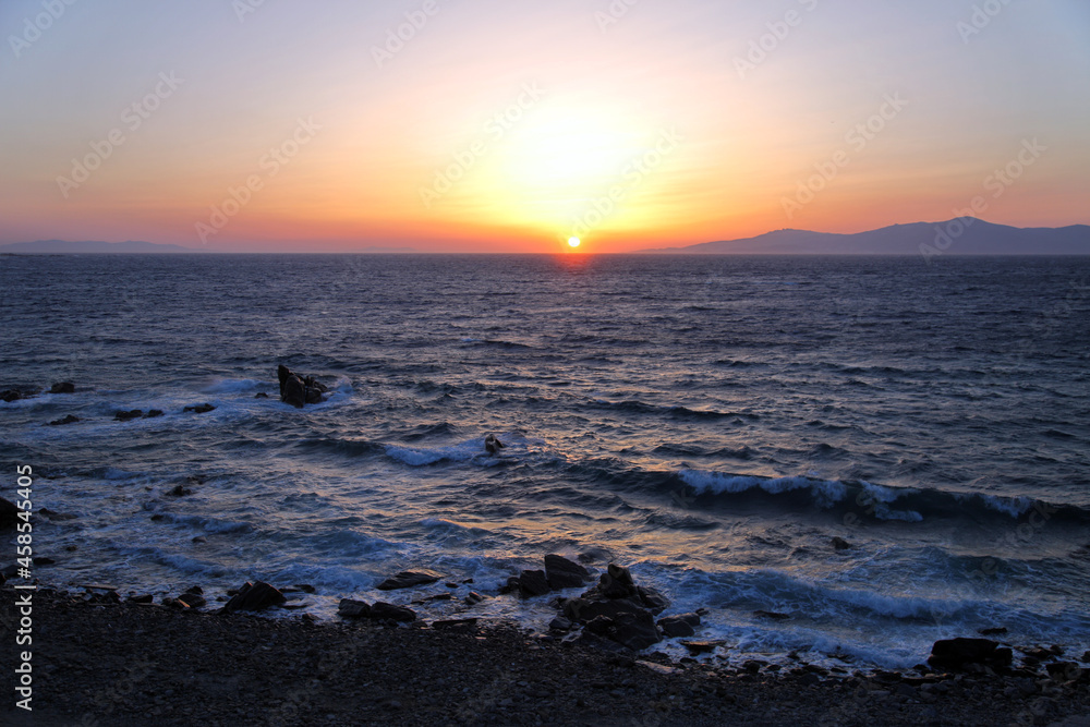 Sunset in beautiful Greek island Mykonos in Greece.