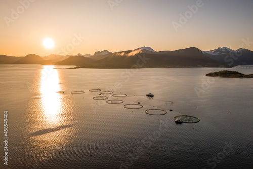 Aquaculture Fish Farm in Norway at Sunrise photo