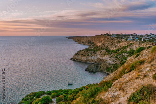 Amazing landscape at sunset, rocks and the sea on Cape Fiolent in Crimea.