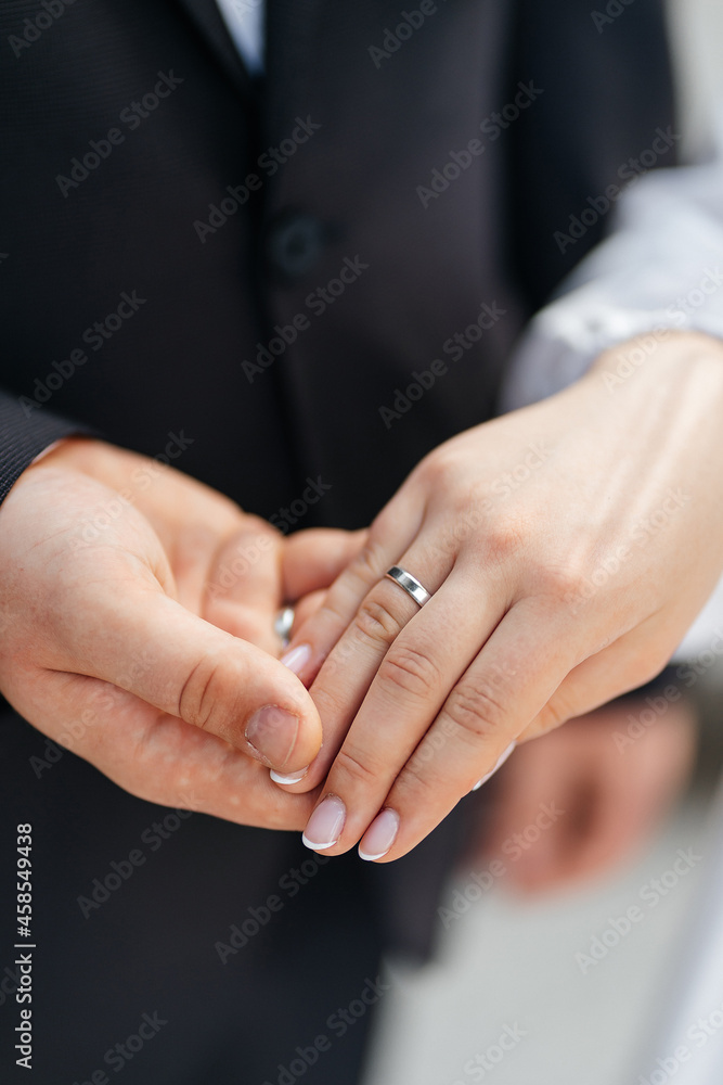 Fototapeta premium Picture of man and woman with wedding ring. holding hands