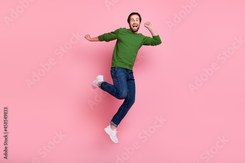 Full length photo of satisfied glad person have fun look camera open mouth isolated on pink color background