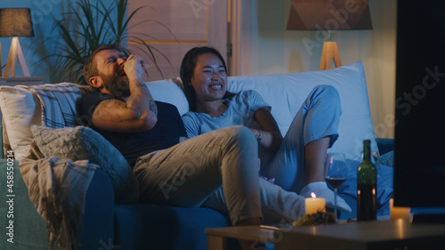 Fotografia Diverse couple watching comedy film in evening