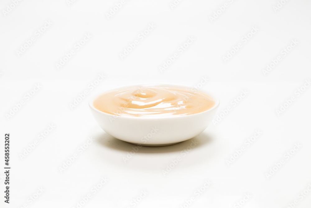 Mushroom sauce in a bowl isolated on white background. Mushroom sauce in a bowl isolated on white background.