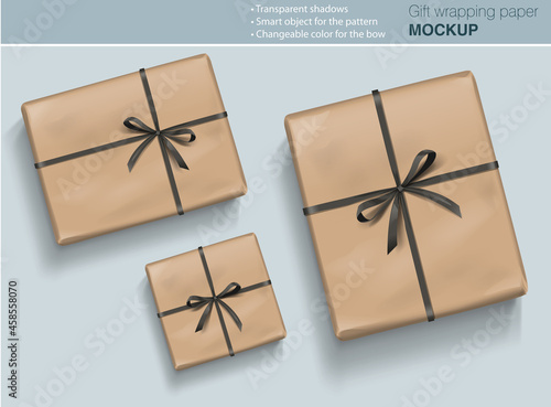 Vector gift paper box mock up with bow on light background with transparent shadows. Wrapping paper  template for your design