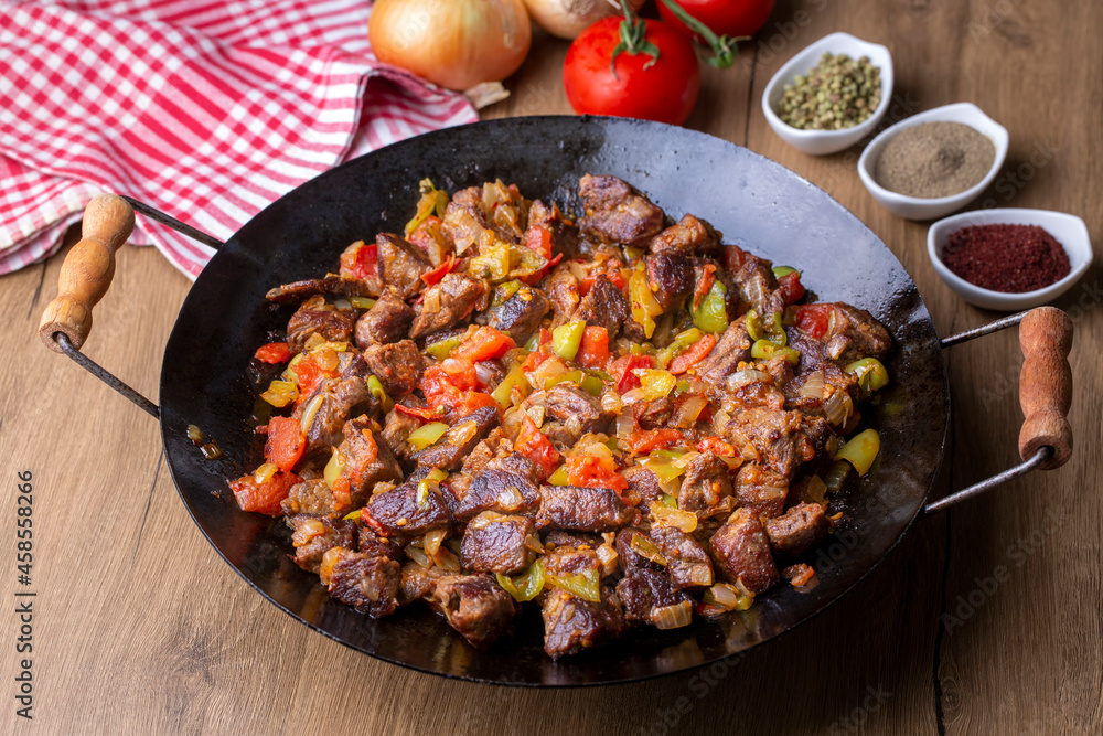 Meat saute in traditional pan - Sac kavurma, Turkish Food Meat saute in traditional pan - Sac kavurma, Turkish Food