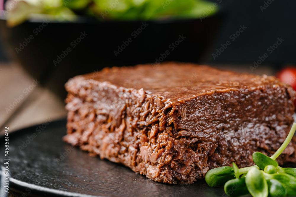 Raw vegetable vegan mince pate on wooden table close-up. Copy space Raw vegetable vegan mince pate on wooden table close-up. Copy space