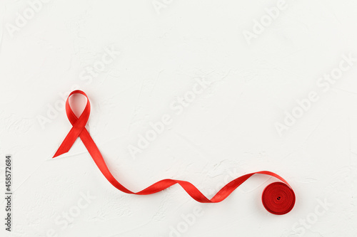 Sign of cancer red ribbon on the table.