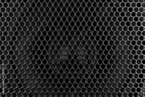 Wallpaper Mural Stylish car audio acoustic round speaker with waffle grill protector cover closeup. Modern music black background texture Torontodigital.ca