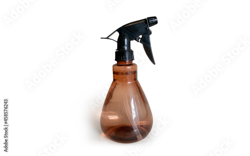 Plastic Transparent Spray Bottle for Gardening, Cleaning, Iron and Household Chores with Vintage Elegant Brown Color - Isolated Object on White Background with Shadow and Reflection