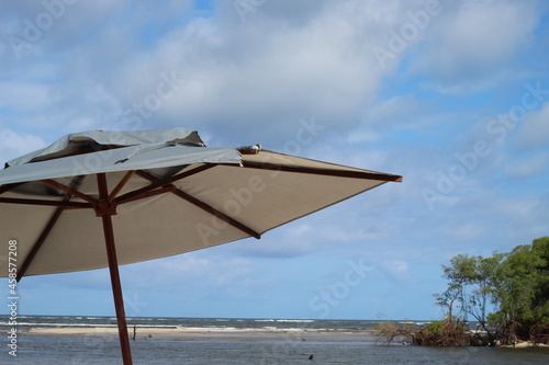 Beach umbrella on the beach.