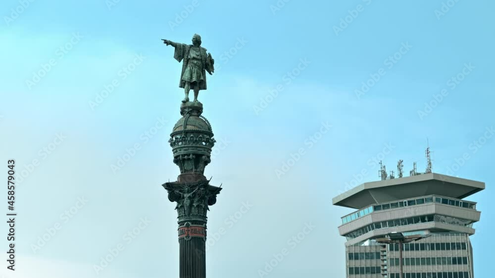 Columbus Monument in Barcelona, Spain. Cloudy sky on the background Columbus Monument in Barcelona, Spain. Cloudy sky on the background