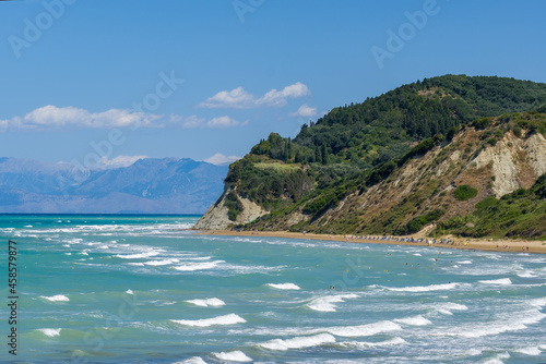 A beautiful bay with waves and cliffs