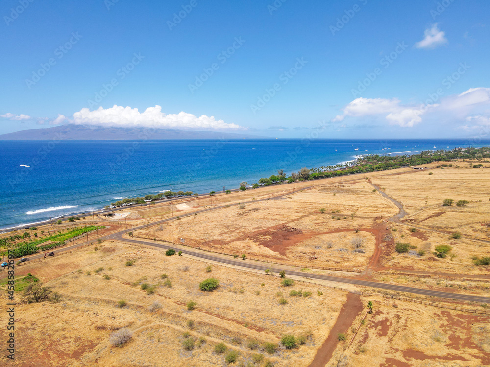 Aerial view Maui Island Beach, Hawaii. Launiupoko State Beach during hot summer. Aerial view Maui Island Beach, Hawaii. Launiupoko State Beach during hot summer.