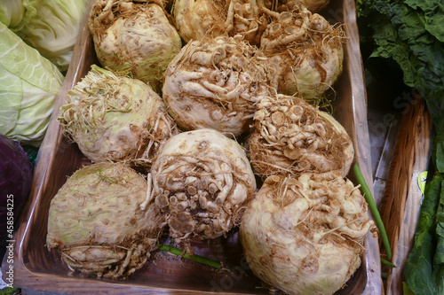 Sellery root on food market in basket. 
