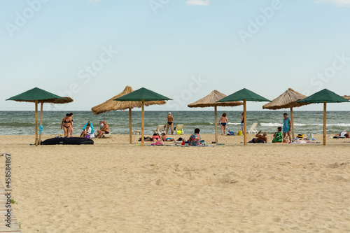 Zatoka  Odessa  Ukraine - September 1  2021  People relaxing on the beach.