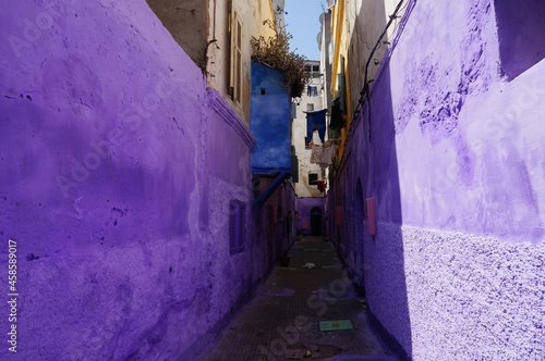 Short dead-end street (cul-de-sac), walls painted purple, Old Medina. Casablanca, Morocco. © aerrant