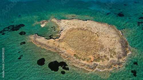 Aerial drone photo of prehistoric settlement of Pavlopetri a sunken city and archaeological site just below surface near popular Pounta beach and Elafonisos island, Peloponnese, Greece