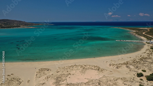 Aerial drone photo of paradise sandy bay and beach of Pounta next to popular island of Elafonisos, Peloponnese, Greece