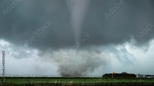 A Tornado Churns In A Field During An Outbreak Of Severe Storms