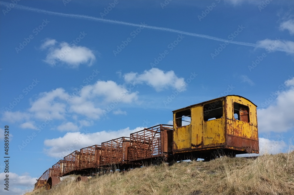 old rusted sky train used to carry turf in ireland