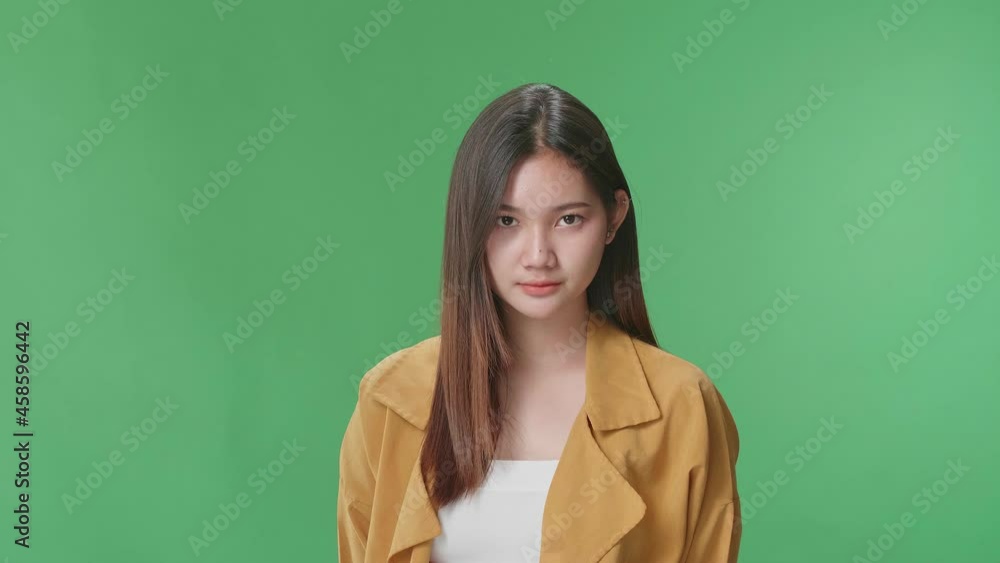Terrible Asian Woman Looking At Camera In The Green Screen Studio
Terrible Asian Woman Looking At Camera In The Green Screen Studio