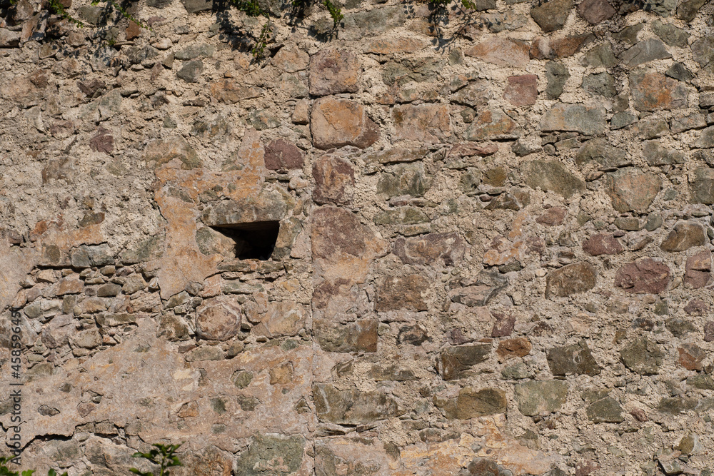 Alte Steinmauer Hintergrund mit kleinem Fenster - Schlossmauer
