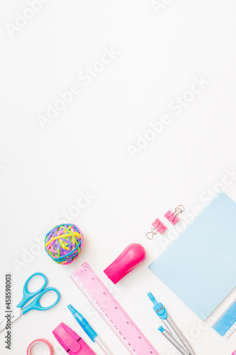 Flat lay school and office supplies on a white background