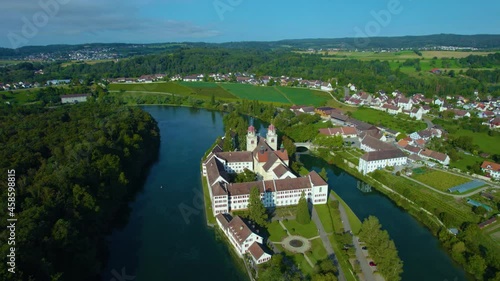  Aerial view of the city and monastery Rheinau in Switzerland on a sunny morning day in summer. photo