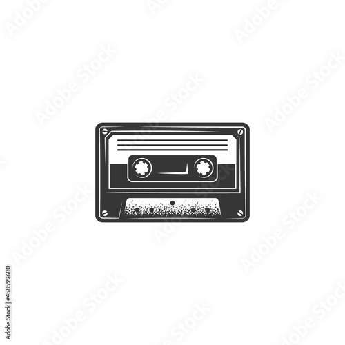 Original monochrome vector illustration. An icon of an old audio cassette in a vintage style.
