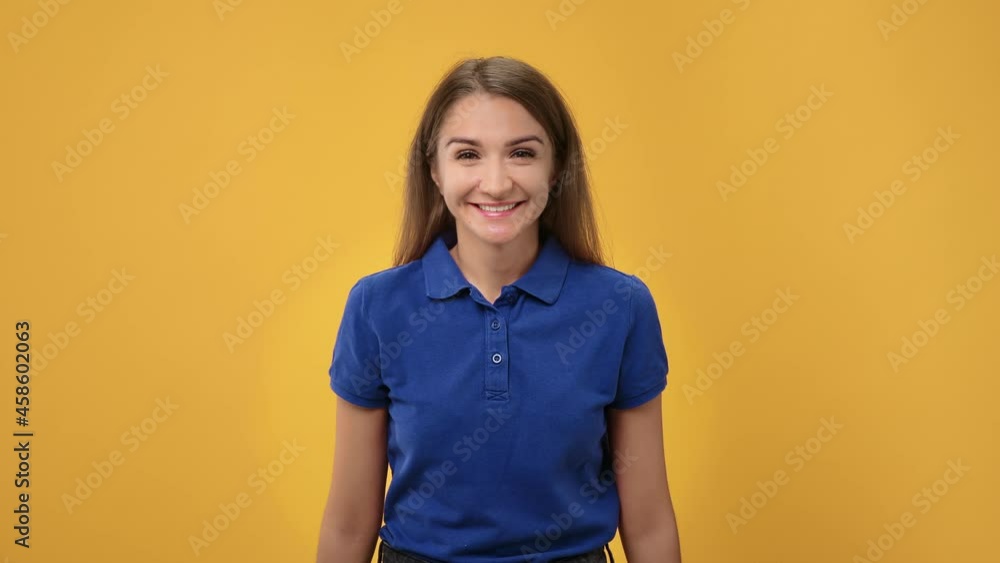 Portrait of woman waving hands inviting joining to her come here gesture isolated on orange studio Portrait of woman waving hands inviting joining to her come here gesture isolated on orange studio