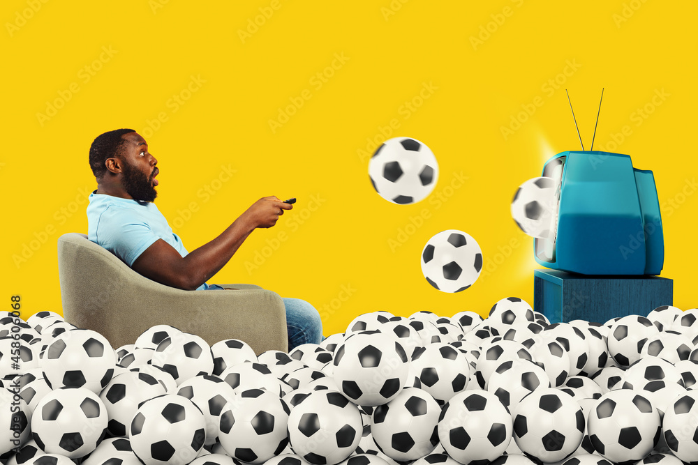 Φωτογραφία Shocked soccer viewer submerged by soccer balls coming out of TV