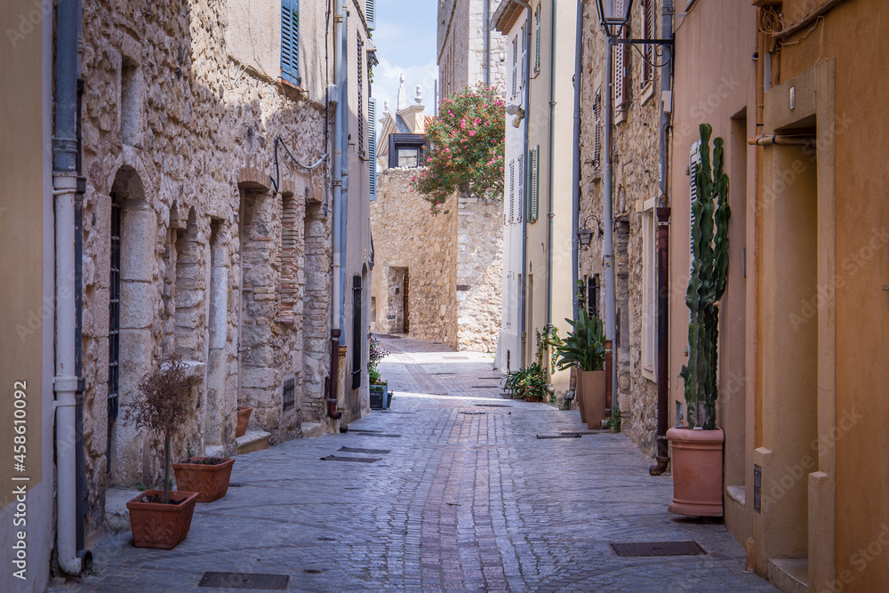 narrow street in old port city of Antibes, France