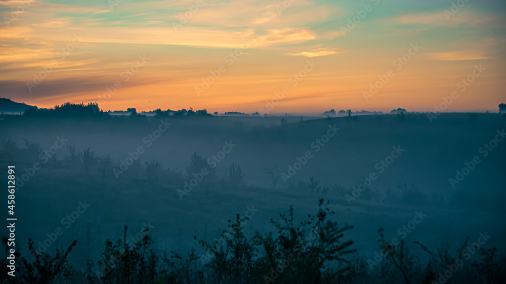 Obraz premium sunset over the river