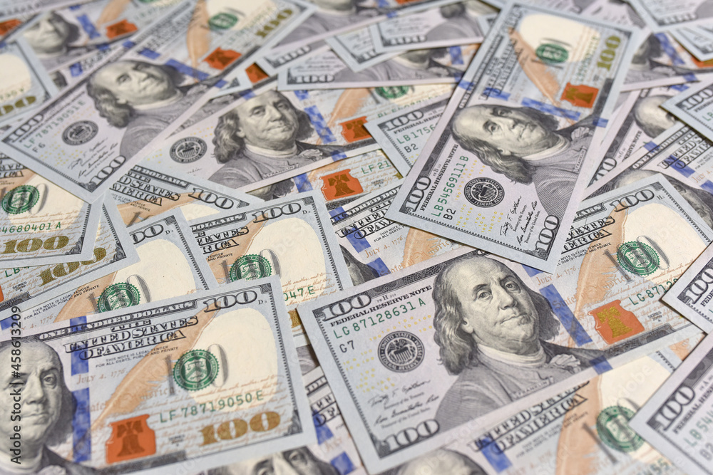 Background from 100 US dollar bills close-up. Money background. Banking and financial concept