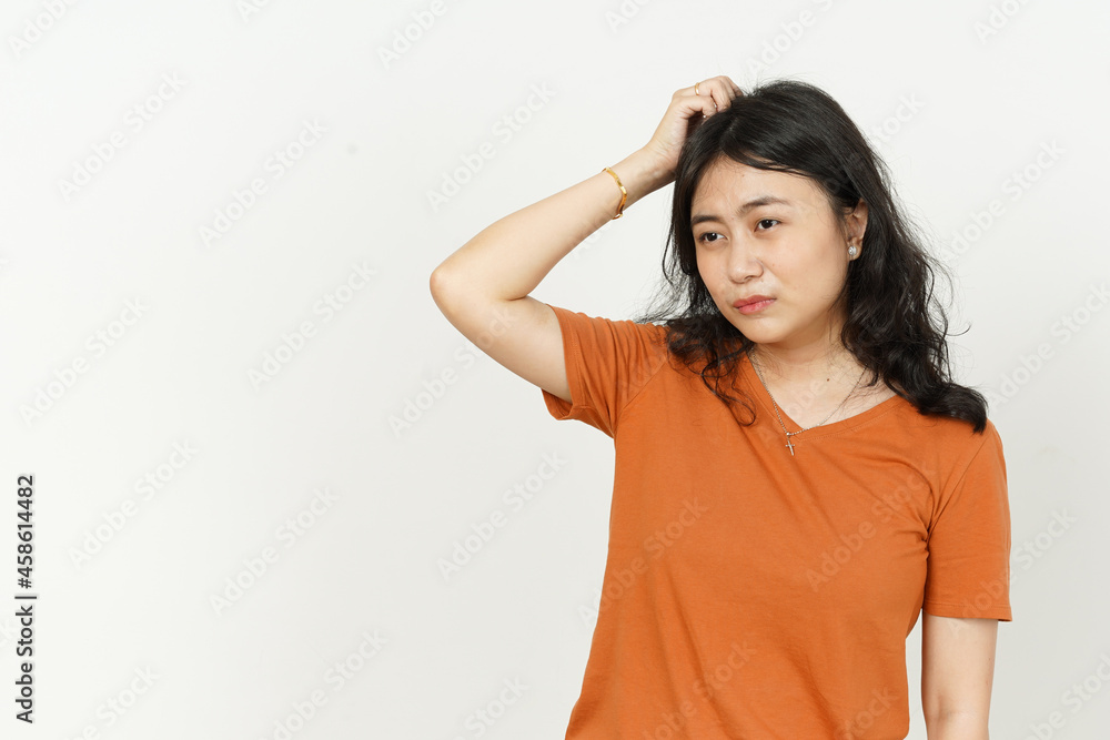 Confused face expression of beautiful asian woman Wearing orange T-shirt isolated on white background Confused face expression of beautiful asian woman Wearing orange T-shirt isolated on white background