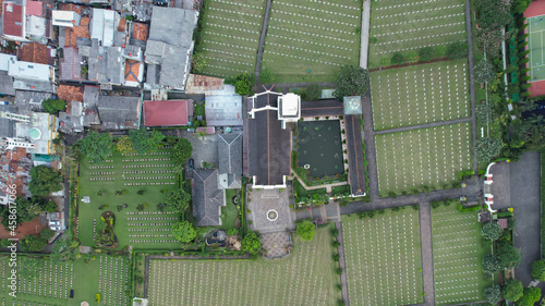 Aerial view of Dutch war graveyard with wooden crosses at Ereveld Menteng Pulo in Jakarta.  photo