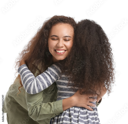 African-American woman hugg...