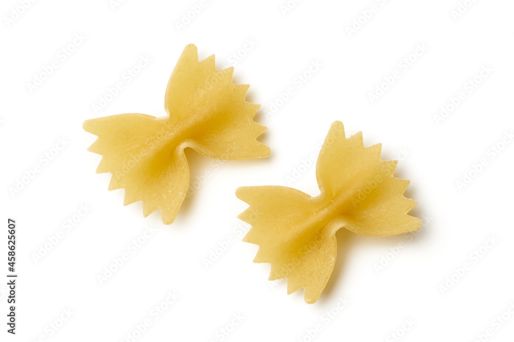 Top view of two raw farfalle pasta isolated on white background. Top view of two raw farfalle pasta isolated on white background.