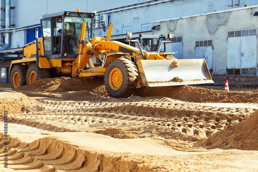 Bulldozer Moving, Leveling The Ground At A Construction Site Stock ...